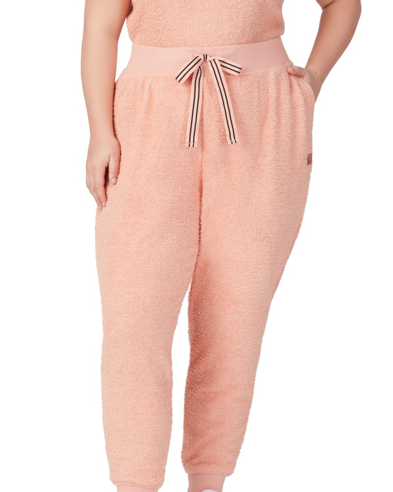 Front of a model wearing a size 1X Cheri Homey Jogger in Peach Beige by FILA. | dia_product_style_image_id:252644